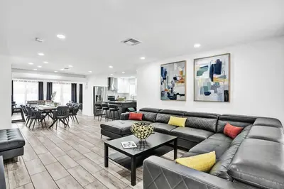 a living room with a couch and a table at Seaside Oasis in Hollywood Lakes near the Beach in Hollywood