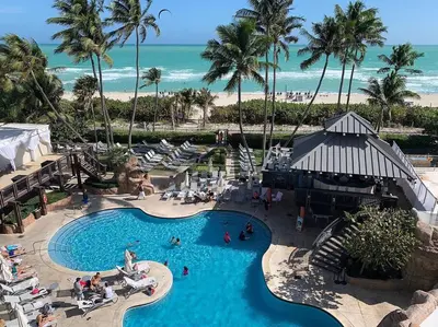 an overhead view of a swimming pool at the beach at AK414- Miami Beach Apt at Oceanfront Resort in Miami Beach