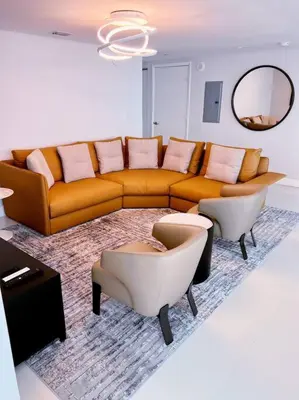 a living room with a couch and two chairs at Luxury condo in Icon W hotel Brickell in Miami