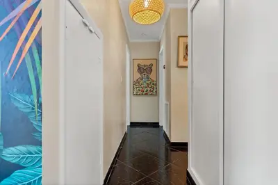 a hallway with white walls and a ceiling at 5 Minute Walk to Wilton Drive in Fort Lauderdale