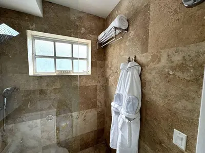 a bathroom with a shower and a toilet at BRAND NEW! Lovely 1 Bedroom with Pool by the Beach in Miami