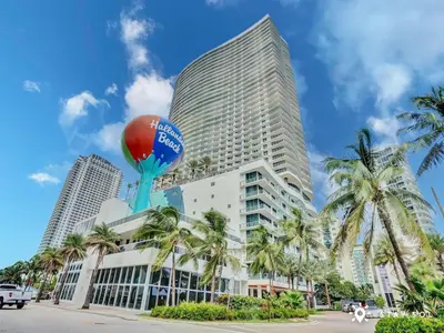a tall building with a balloon in front of it at Hollywood Beachfront Apt Amazing View & Amenities in Hollywood