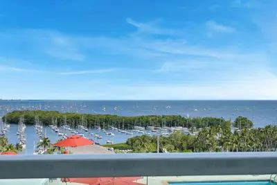 a view of a marina with boats in the water at Astonishing SEA VIEW Studio in Grove in Miami