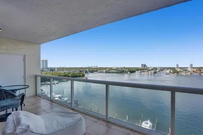 a balcony with a view of the water at Le Petit Italie ,water View 22 With Pool in Sunny Isles Beach