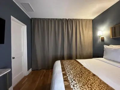 a bedroom with a bed and a window at Hotel TB Downtown Miami in Miami