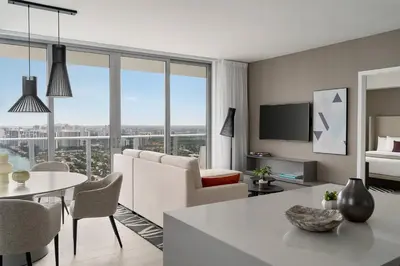 a living room with a couch and a table at Hyde Beach by Zelloo in Hollywood