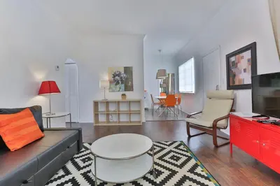 a living room with a couch and a table at 3 Bedroom Apartment with BBQ and Patio, Near Brickell in Miami