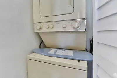 an old oven with a table on top of it at 3 Bedroom Apartment with BBQ and Patio, Near Brickell in Miami