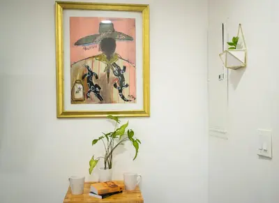 a picture of a man with a hat on a wall at Cozy Tiny Home - Hidden Gem! in Miami