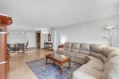 a living room with a couch and a coffee table at 2 Bedrooms Unit OceanFront Resort The Alexander in Miami Beach