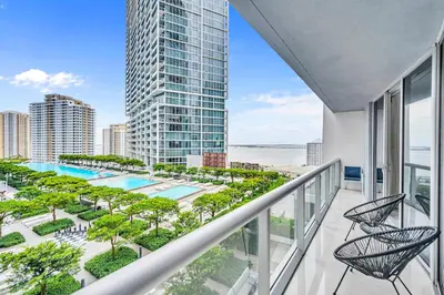 a balcony with chairs and a view of the city at Unique 1BR Icon Brickell WaterViews-Freespa in Miami