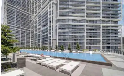 a rendering of a large building with a pool at Unique 1BR Icon Brickell WaterViews-Freespa in Miami