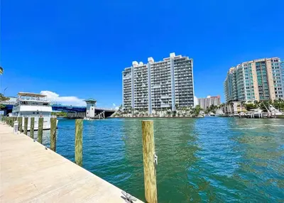 a view of a river with buildings in the background at GalleryOne Doubletree Hilton GC Turtle Cove in Fort Lauderdale