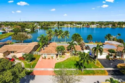 an aerial view of a resort with a large body of water at Inactive 193 Modern, 4B&3B with Pool and Lake in Pembroke Pines