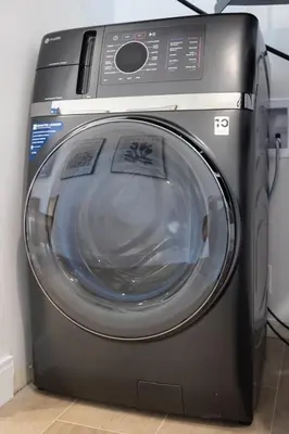 a washing machine is sitting in a room at Gorgeous coastal PH with Large Private Terrace in Miami Beach