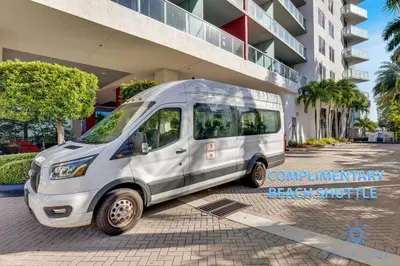 a white van parked in front of a building at Amazing Studio Spectacular Amenities Near Beach in Hallandale Beach