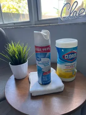 a table with a bottle of glue and a container of paint at Chic Private Retreat in Homestead