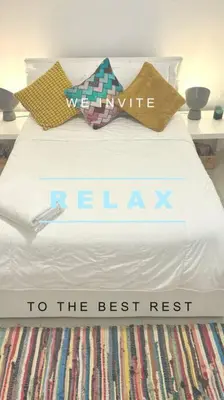a bed with a sign that says hello to the best rest at GroveO5 10 minutes from Miami Beach in Miami