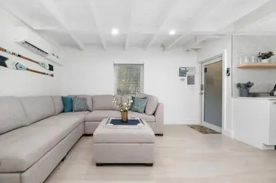 a living room with a couch and a coffee table at The Riverside Retreat 1 in Fort Lauderdale
