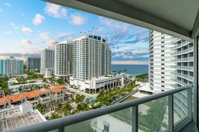 a view of a city from the balcony of a building at 2BR Fort Lauderdale W Residence with Double Living Room, Ocean & Intercoastal Views, Brand New Sofas! in Fort Lauderdale