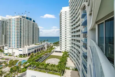a view of the ocean from the balcony of a building at 2BR Fort Lauderdale W Residence with Double Living Room, Ocean & Intercoastal Views, Brand New Sofas! in Fort Lauderdale