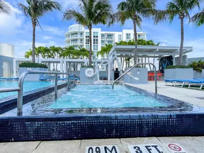 a pool at a resort with a slide at 2BR Fort Lauderdale W Residence with Double Living Room, Ocean & Intercoastal Views, Brand New Sofas! in Fort Lauderdale
