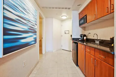 a kitchen with a sink and a counter top at Trump International Beach Resort Deluxe 2 Queen Ocean Front in Sunny Isles Beach