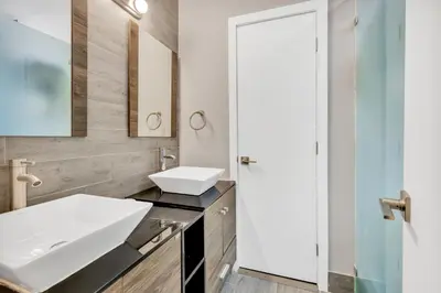 a bathroom with a sink and a mirror at ULTRA magical apartment at the Beach in Hollywood