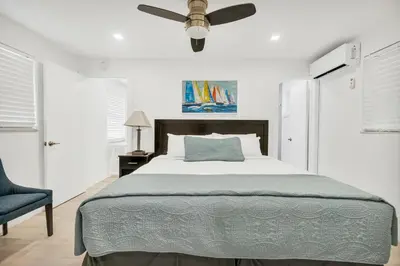 a bedroom with a bed and a ceiling fan at ULTRA exciting apartment at the Boardwalk in Hollywood