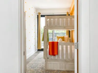 a childs bunk bed in a childs bedroom at Villa Palma - Prime Location, Pool, Game Room, Outdoor Kitchen in Miami