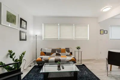a living room with a couch and a table at Vibrant Little Havana Apt Near Brickell in Miami
