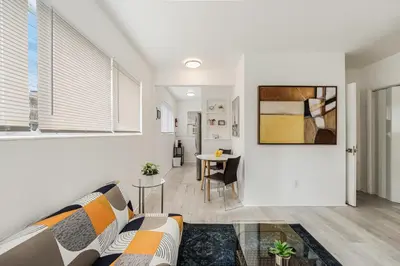 a living room with a couch and a table at Vibrant Little Havana Apt Near Brickell in Miami