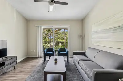 a living room with a couch and a table at Kasa Hollywood Fort Lauderdale in Dania Beach