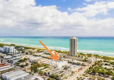an aerial view of a city and the ocean at 1Bedroom Collins 2 Blocks to Ocean with Paid Street Parking in Miami Beach