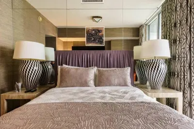 a bedroom with two lamps and a bed at Luxurious Stunning Views condo in Miami