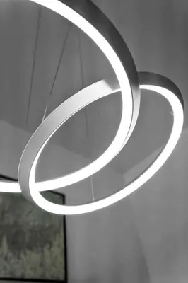 a circular light hanging from a ceiling at Stylish Lux Apt 5 min walking to Design District apt 7 in Miami