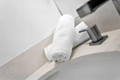 a roll of toilet paper sitting on a bathroom sink at Comfy Apt 5 min walking to Design District apt 4 in Miami