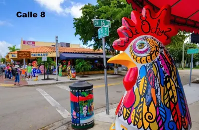 a chicken statue sitting on the side of a street at Coco Sol 2 by MyMiamiStay in Miami