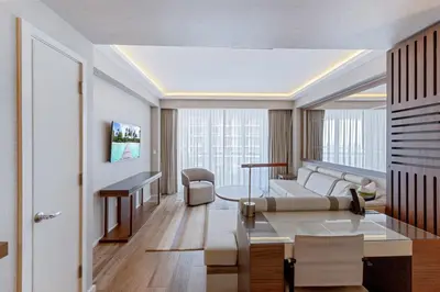 a living room with a couch and a table at Stylish Oceanview Apartment Prime Location in Fort Lauderdale