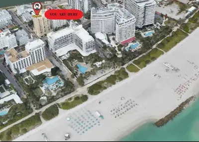 a map of a city with a sign that says you are here at 1402- Oceanfront 1BR & 1 Bath Retreat with Stunning Views in Miami Beach