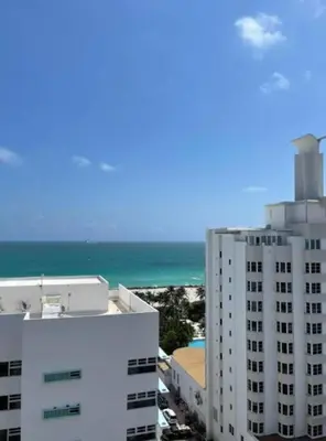 a view of two tall buildings and the ocean at 1502- Seaside Serenity- 1BR & 1BA, Ocean Views in Miami Beach