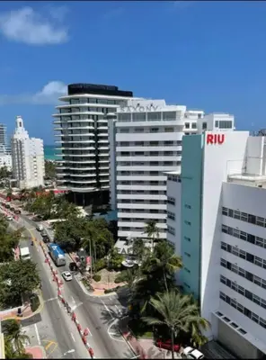a city with tall buildings and a street with cars at 1502- Seaside Serenity- 1BR & 1BA, Ocean Views in Miami Beach
