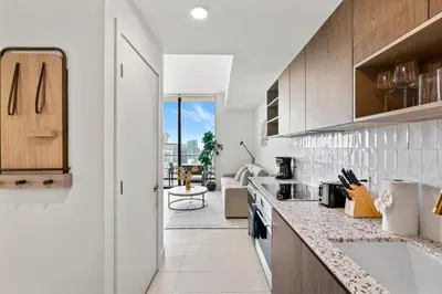 a kitchen with white cabinets and a counter top at 5108Great Penthouse, Bay view, in the heart of MIAMI in Miami