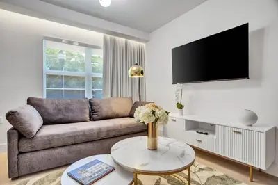 a living room with a couch and a table at Vonder Miami Beach - Unit 1 in Miami Beach