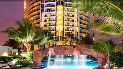 a hotel with a water park in front of a building at Luxury Bayfront Studio with Balcony Amazing Pool in Sunny Isles Beach