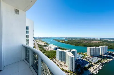 a view from the balcony of a building at Sophisticated Modern Gem with Unreal Ocean Views in Sunny Isles Beach