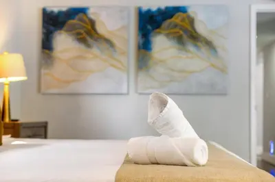a wrapped up foot on a bed with a cast at Luxurious Hollywood Retreat Perfect Getaway in Hollywood