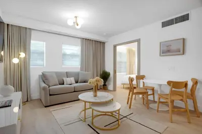 a living room with a couch and a table at Vonder Miami Beach - Unit 5 in Miami Beach