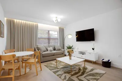 a living room with a couch and a table at Vonder Miami Beach - Unit 11 in Miami Beach
