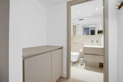a bathroom with a sink and a toilet and a mirror at Vonder Miami Beach - Unit 18 in Miami Beach